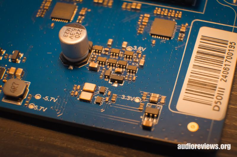 The main +/-5.7VDC supply sits very close to the sensitive clock circuit.